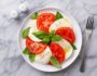 Insalta caprese is Fresh mozzarella, ripe tomatoes, and fragrant basil,